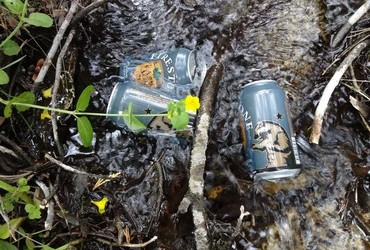 Beer in the creek -  find happiness in the simplest of things