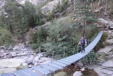 Spasimata suspension footbridge on the GR20 to cross the creek into the throats of Muvrella